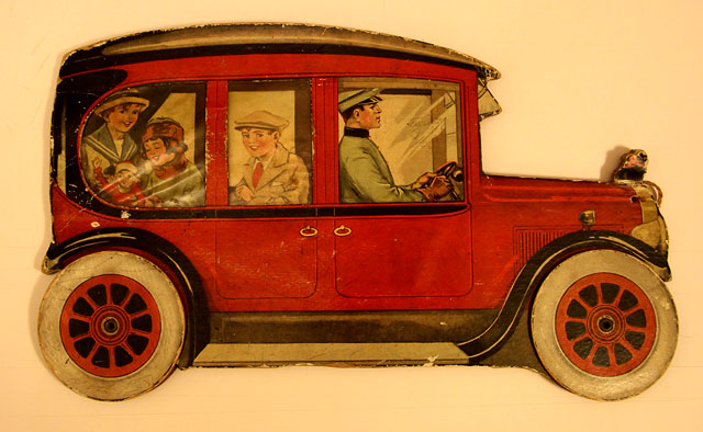 A children's 'book toy' by Valentine & Sons Ltd  -  'The Story of the Motor Car'