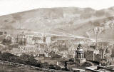 Holyrood Abbey and Palace and the Burns Monument in Regent Road  -  Photograph by George Washington Wilson