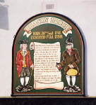 A sign on the side of Deacon Brodie's Tavern in Bank Street