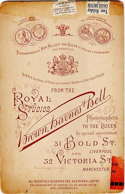 The back of a cabinet print by Brown Barnes & Bell, with labels from a White Star Lline cruise  -  date not known