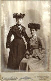 Cabinet print by Ovinius Davis  -  Two ladies in matching outfits