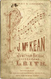 The back of a Cabinet Print by John McKean  -  Family of 7 + baby