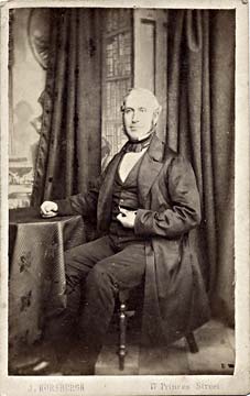  A carte de visite by John Horsburgh  from studio at 17 Princes Street  -  man at table