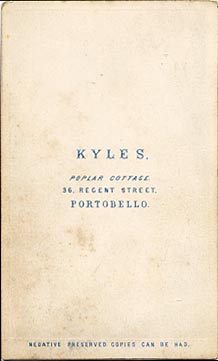 The back of a carte de visite  -  Kyles  -  36 Regent Street  -  Lady, book and pillar