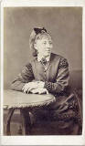 Carte de visite by P Nimmo & Son  -  Lady at table  -  1872