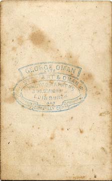 Stewart & Oman  -  The back of a Carte de Visite of a lady seated