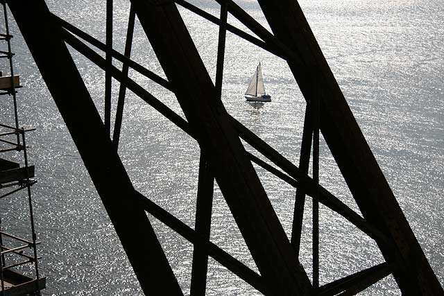 Looking down from the Forth Bridge  -  A yacht close to South Queensferry.