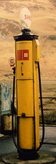 Zoom-in to an old Shell petrol pump in the Scottish Highlands  -  still in use in the 1980s