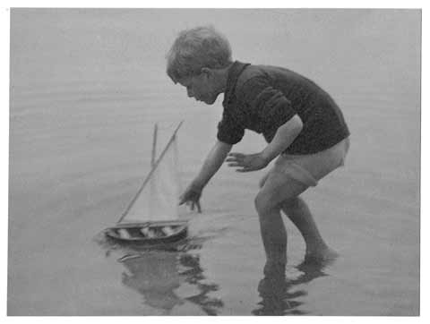 Photograph by AH Maclucas of his son, Norman - boat sailing