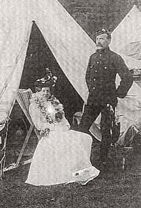 Ediinburgh Professional Photographers  -  John Drummond with military tent and his wife, Minnie  -  probably photographed around 1910.