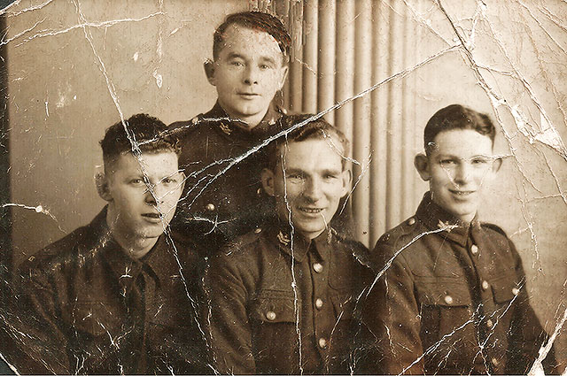 Four  brothers, all members of theScots Guards, taken at Jerome's Studio, 79 Leith Street, in 1939