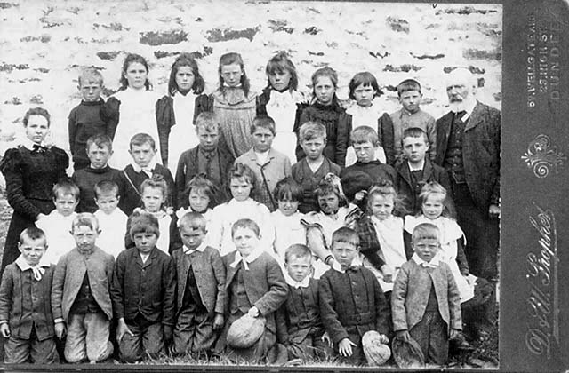 A photograph  by D & W Prophet of a school class at Reay, Caithness in the north of Scotland  -  c1898