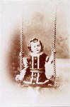 Photograph from the Turner Family Album  -  Harold W Turner on a Swing