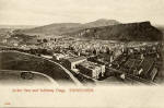 A postcard by Hartmann  -  A sepia view of Arthur Seat and Salisbury Crags from Calton Hill