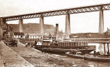 The Queensferry Passage:  The ferry boat, 'Woolwich' at  the Hawes Pier, beside the Forth Bridge  -  Postcard posted 1919