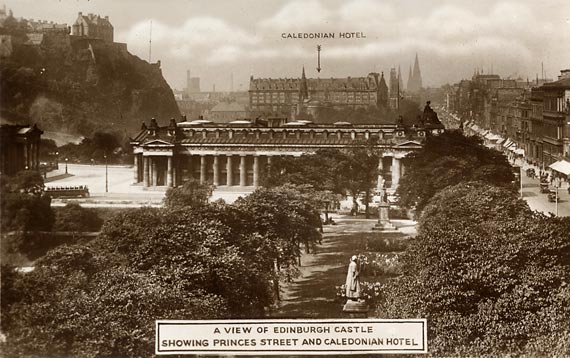 Postcard produced for the LMS Railway  -  Looking from the Scott Monument towards the Caledonian Hotel, at the corner of Lothian Road and Princes Street.