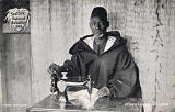 Postcard by John A McCulloch, Edinburgh  -  The Tailor in the Senegalese Village at the Scottish National Exhibition, 1908