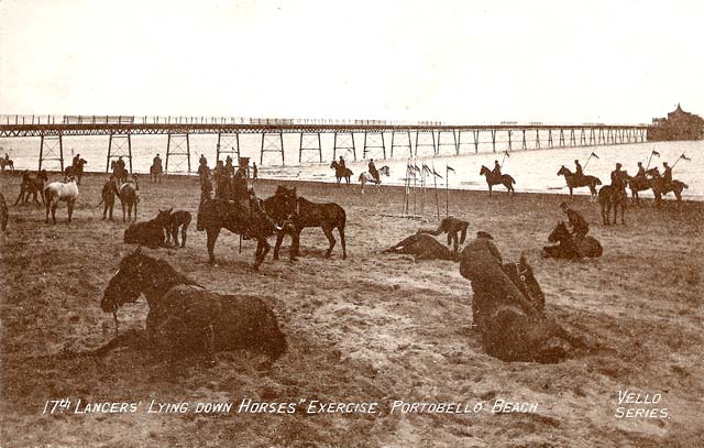 Postcard in P W & M Vello Series  -  Portobello Beach + Pier  -  17th Lancers 'Laying Horses' exercise