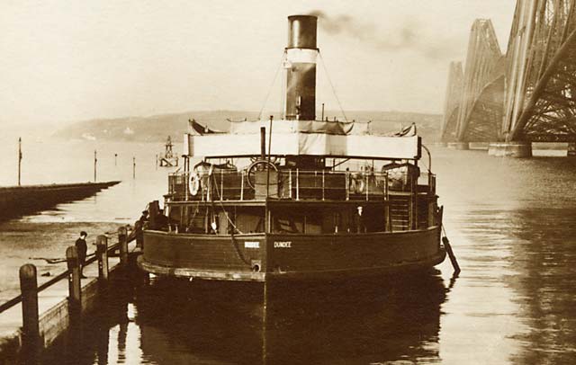 The Forth Rail Bridge and the ferry boat, Dundee, on the Queensferry Passage at South Queensferry  -  between 1920 and 1948