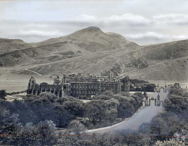 JB White - an original black and white photo used to produce a coloured postcard  -  Holyrrood Palace and Abbey