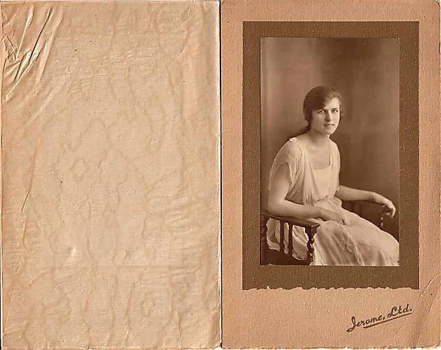 A folder containing a postcard portrait of Nancye Freeman taken in Jerome's Studio