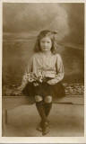 Jerome postcard  -  1932  -  Girl with Flowers