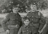 Detail from a Postcard Portrait from Morrison's Studio, Portobello  -  Mascot and 2 Soldiers  -  which regiment?