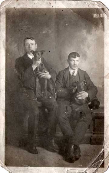 Photograph of two brothers from Leith with whippets  -  taken by an unidentified photographer