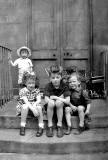4 young children on the steps in Albany Street  -  Around 1945-46