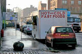 A snack van in Bath Road close to the entrance to Leith Docks.  This view looks towards Salamander Street  -  31 October 2005