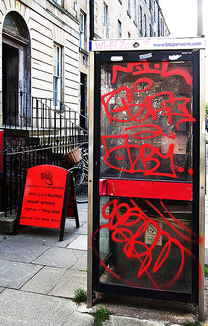 Telephone Box, covered in fraffiti, Buccleuych Street, Edinburgh  -  July 2013