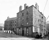 Tenements and Pub at 7-21 Canon Mills, on the site where the Esso Petrol Station now stands