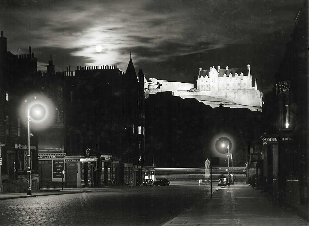 Photograph by Norward Inglis  -  View towards a floodlit Edinburgh Castle from Castle Street