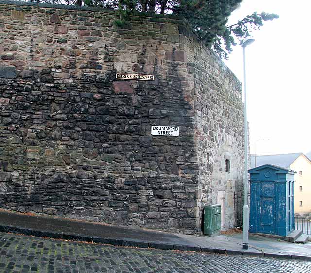 The Flodden Wall and Police Box on the corner of Drummond Street and Pleasance  -  December 2007