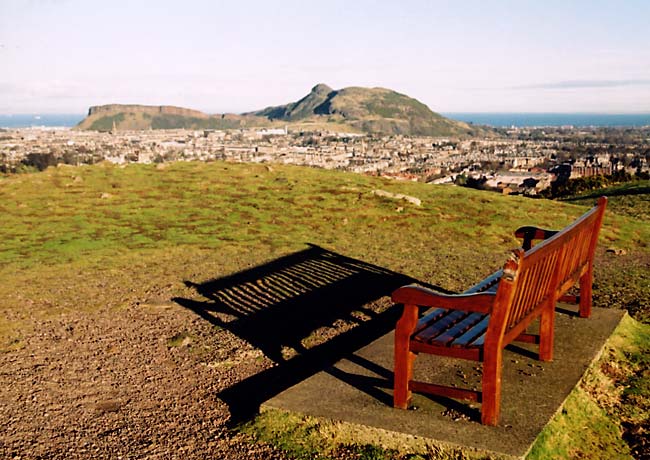 Bench on the top of Blackford Hill, and view towards Arthur Seat