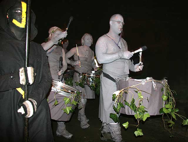 A Torch Bearer and Drummers in the procession proceed along the NW edge of Calton Hill, about to be acttacked by the Red Men   -  April 30, 2008