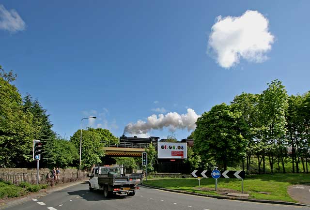 A Scottish Railway Preservation Society steam train excursion around the Edinburgh South Suburban Line and Fife Circle line crosses the roundabout at Cameron Toll, Edinburgh  -  May18, 2008