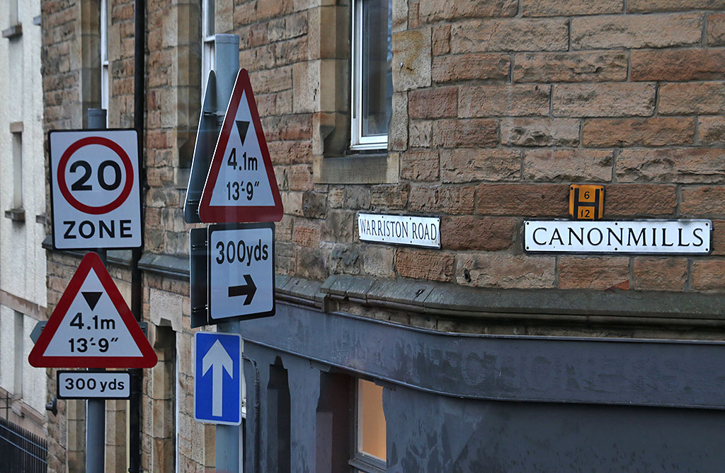 Road signs at a junction near the Canonmills Clock