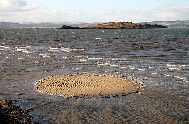 Cramond Island and sand at Silverknowes about to be covered by the incoming tide