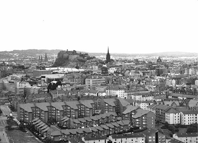 Looking down on Dumbiedykes and out towards Edinburgh Castle from Salisbury Crags  -  1995