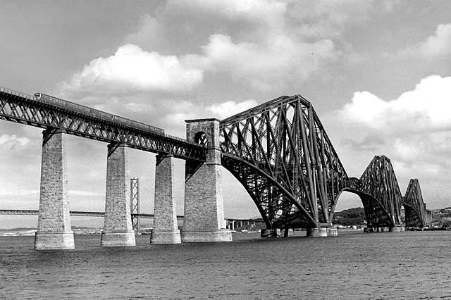 A diesel multiple unit crosses the southern end of the Forth Rail Bridge  -  1964