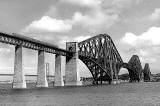A diesel multiple unit crosses the southern end of the Forth Rail Bridge  -  1964