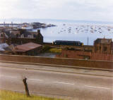 Looking down on Granton Harbour in the 1970s, with 2 Northern Lighthouse ships in the harbour