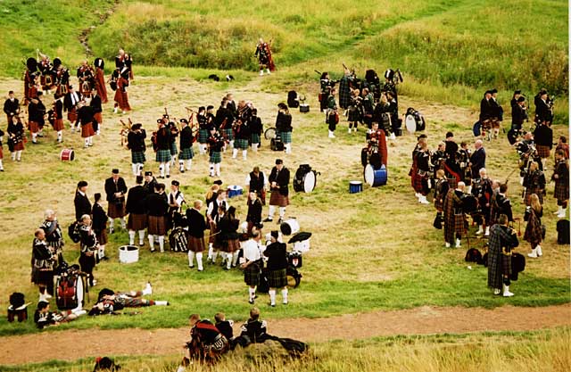 Pipers gather in Hunter's Bog on Arthur's Seat in Queen's Park, Edinburgh, to take part in the ceremony of "Beating the Retreat" on 17 August 2003