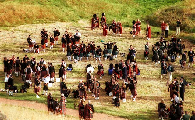 Pipers gather in Hunter's Bog in Queen's Park, in preparation for the ceremony of "Beating the Retreat" on 17 August 2003