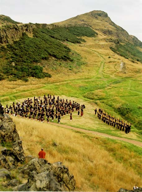 Pipers line up in Hunter's Bog on Arthur's Seat in Queen's Park, Edinburgh, to participate in the ceremony of "Trooping the Colour"