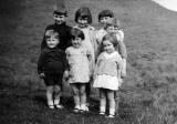 Seven children from Holyrood Square, in Holyrood Park  -  around 1937