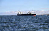 The tanker 'Delta Captaion' takes oil on board at Hound Point Terminal