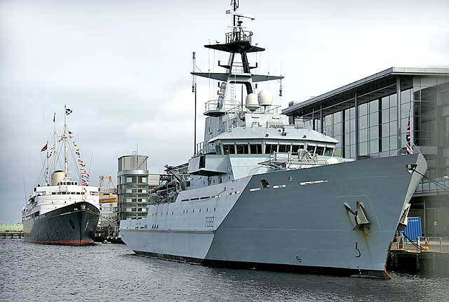 HMS Severn (P282) and Royal Yacht Britannia, moored beside Ocean Terminal in Leith Western Harbour