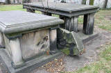 Gravestones in North Leith Graveyard  -  a broken gravestone with many engraved symbols